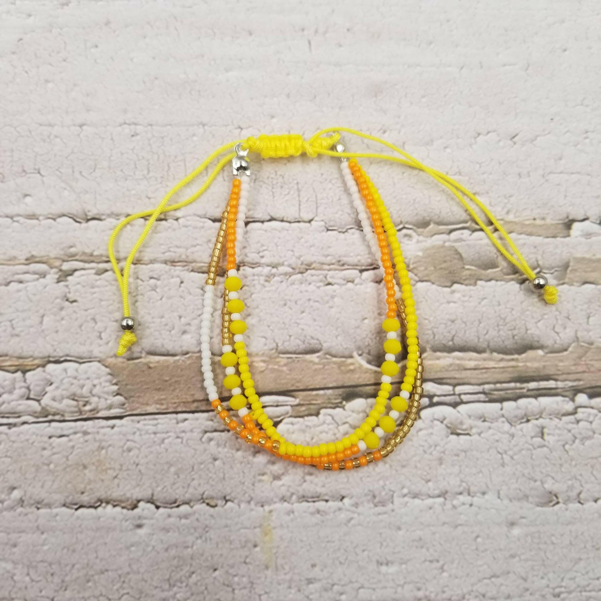 yellow layered beads bracelet